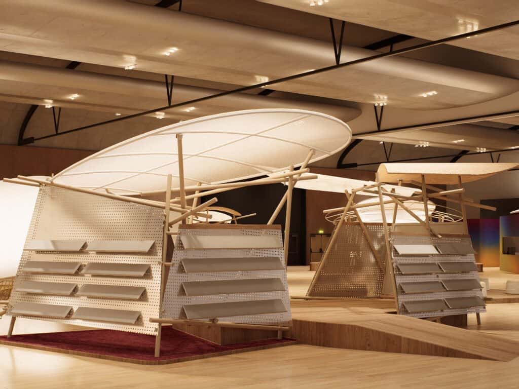 Contemporary exhibition display with wooden and metal structures featuring empty angled shelves, set in a spacious, well-lit hall with modern ceiling design.