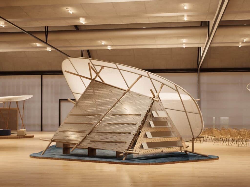 A modern wooden structure with angled panels and a curved mesh roof stands on a blue platform in a large, well-lit indoor space.