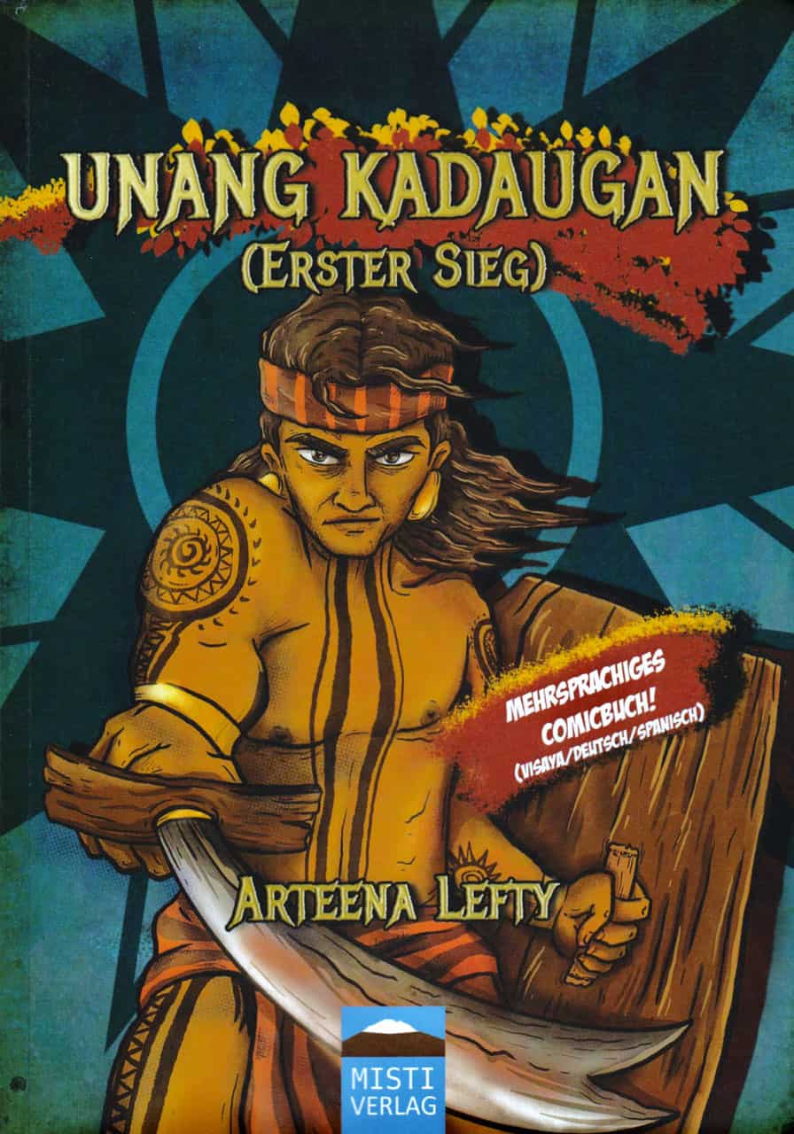 A comic book cover featuring a determined warrior holding a large blade, titled "Unang Kadaugan (Erster Sieg)" by Arteena Lefty. Text indicates it is multilingual: Visaya, German, and Spanish.
